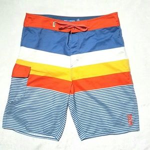 Vans off the wall orange white blue yellow stripe